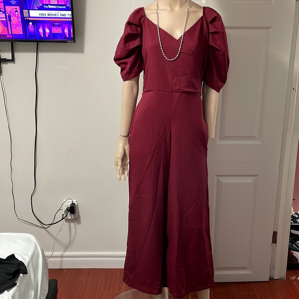 Gorgeous jumpsuit.Med to large regular size
